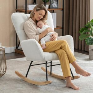 Ivory Teddy upholstered glider rocking chair in a cozy nursery corner for feeding and bonding
