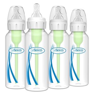 Dr. Brown’s Natural Flow anti-colic narrow baby bottles with slow-flow nipples in a chic nursery
