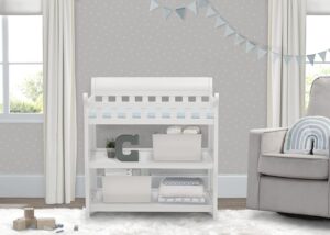Infant changing table with shelves