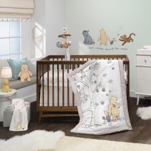 Winnie the Pooh nursery crib bedding set with soft neutral tones, classic Pooh illustration, cozy storybook baby room decor idea