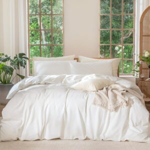 white cotton duvet cover set in cozy bedroom