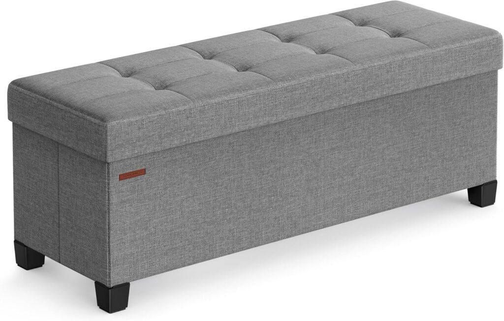 foldable storage ottoman bench in small living room for space saving organization
