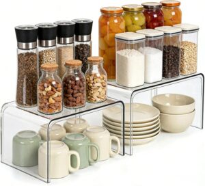 crylic shelf risers organizing plates and bowls to maximize cabinet storage space