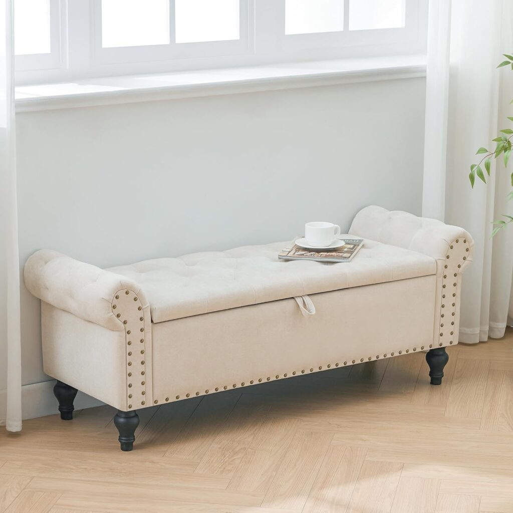 upholstered storage bench at end of bed in modern bedroom