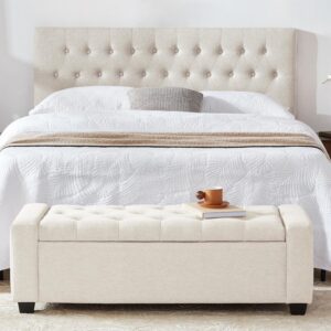 storage solution with ottoman in front of bed