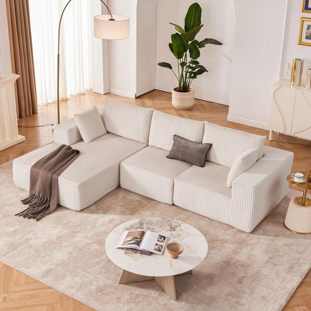 L shaped cloud couch sectional in small living room neutral decor styl