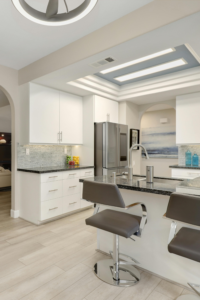 Organized kitchen with clean countertops, drawer dividers, and functional storage solutions