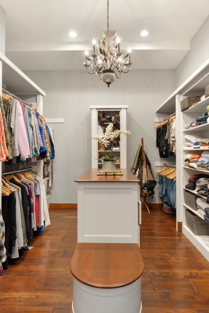 Organized closet with matching hangers, storage bins, and space-saving organization solutions